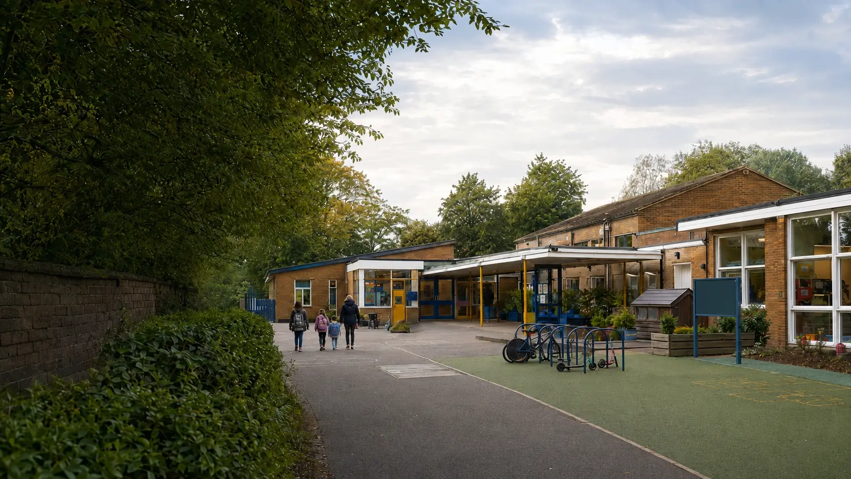 Primary-school buildings, playground and bicycle racks